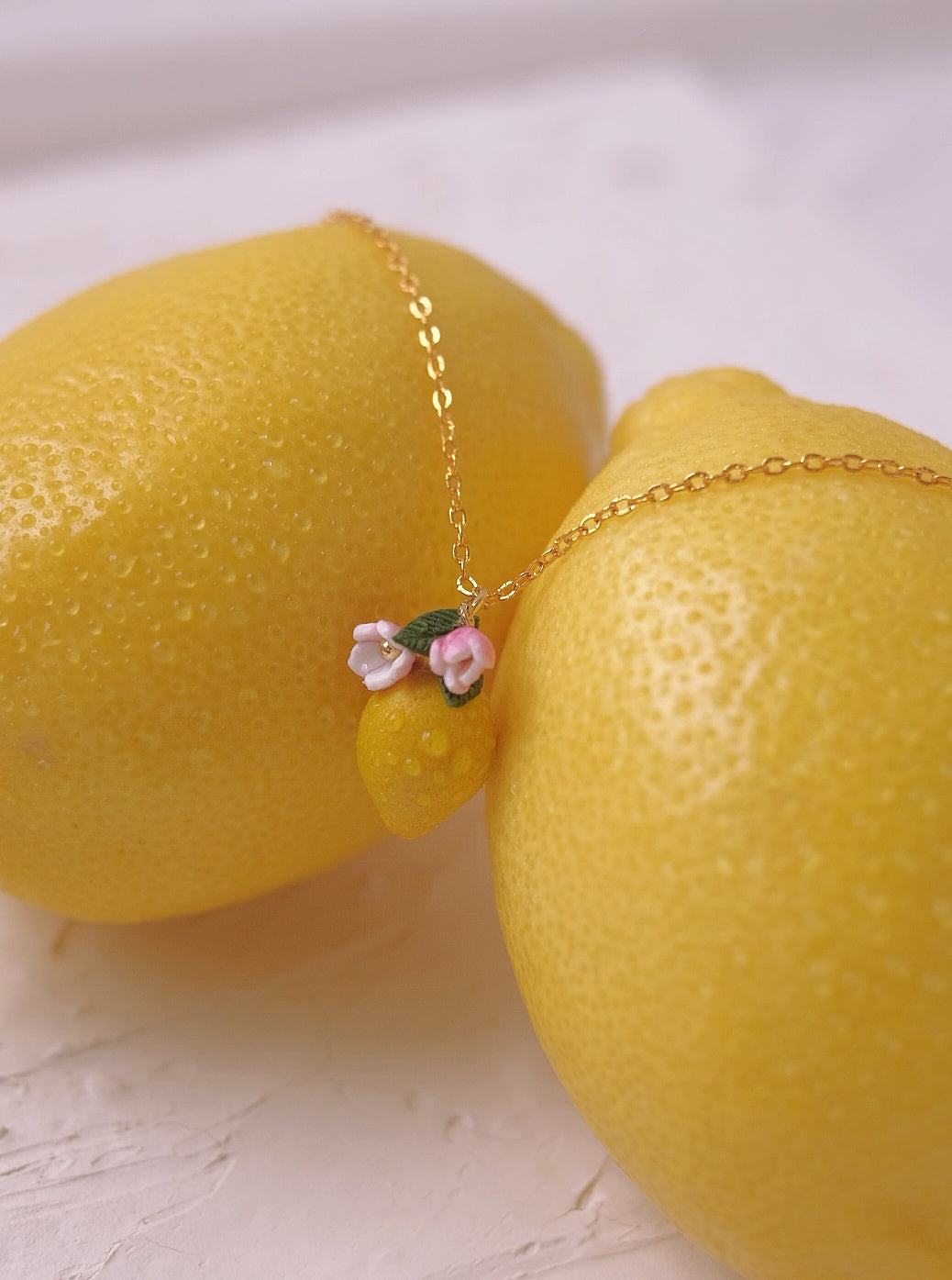 Sour Surprise Pendent by Made of clay
