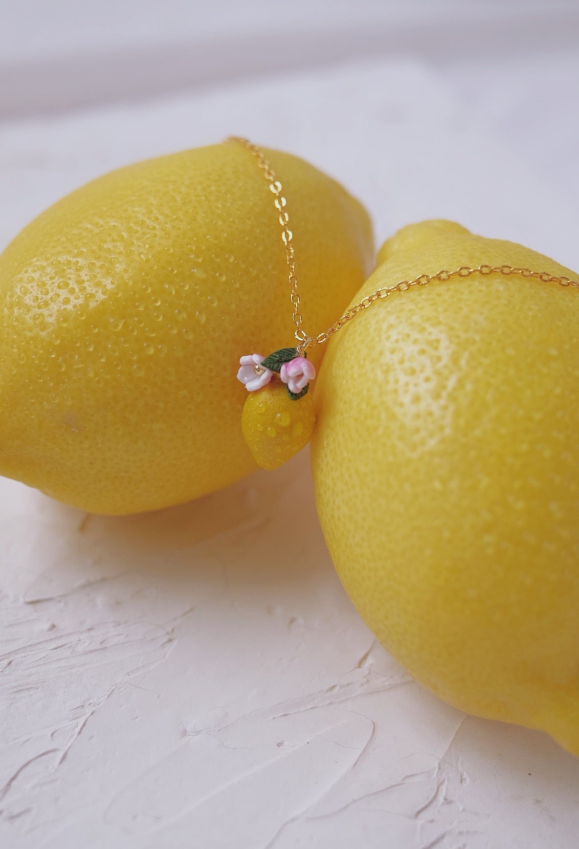 Sour Surprise Pendent by Made of clay