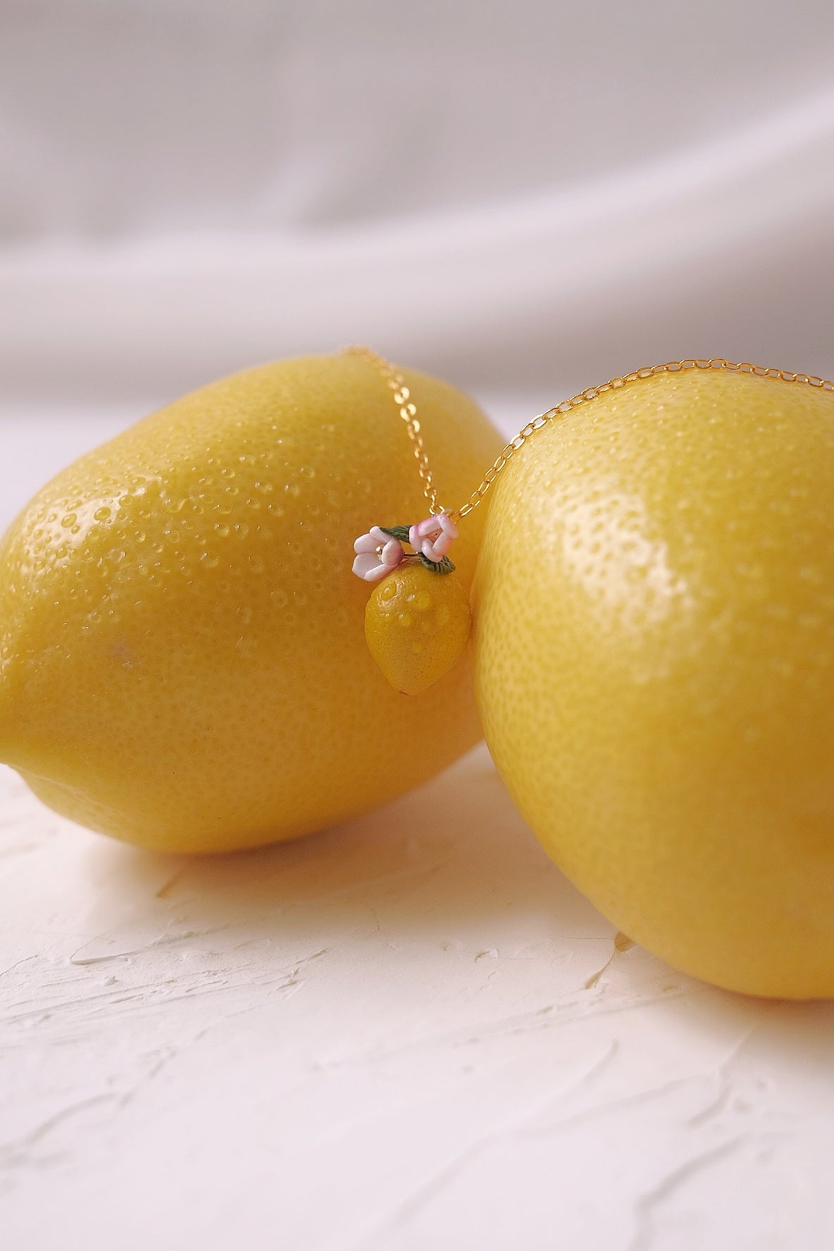 Sour Surprise Pendent by Made of clay