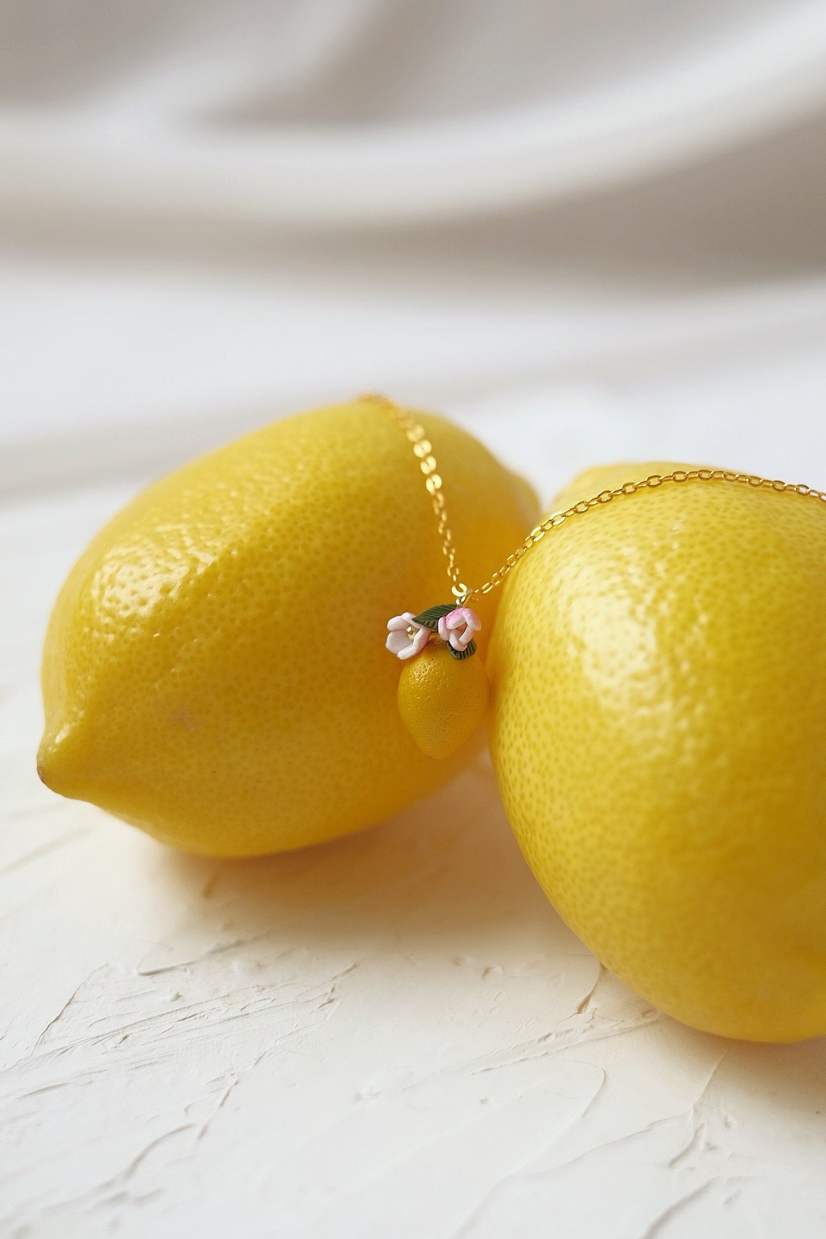 Sour Surprise Pendent by Made of clay