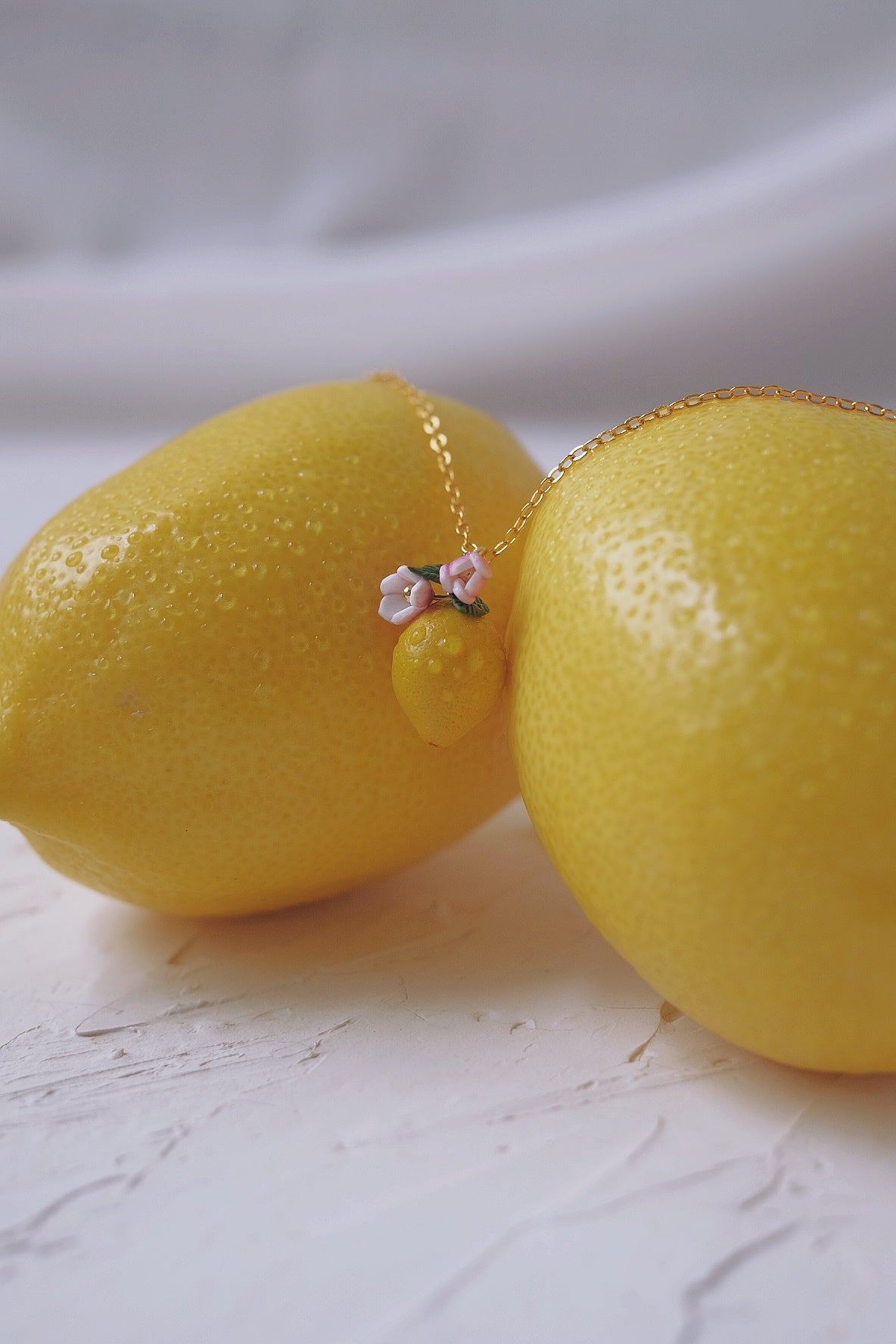 Sour Surprise Pendent by Made of clay