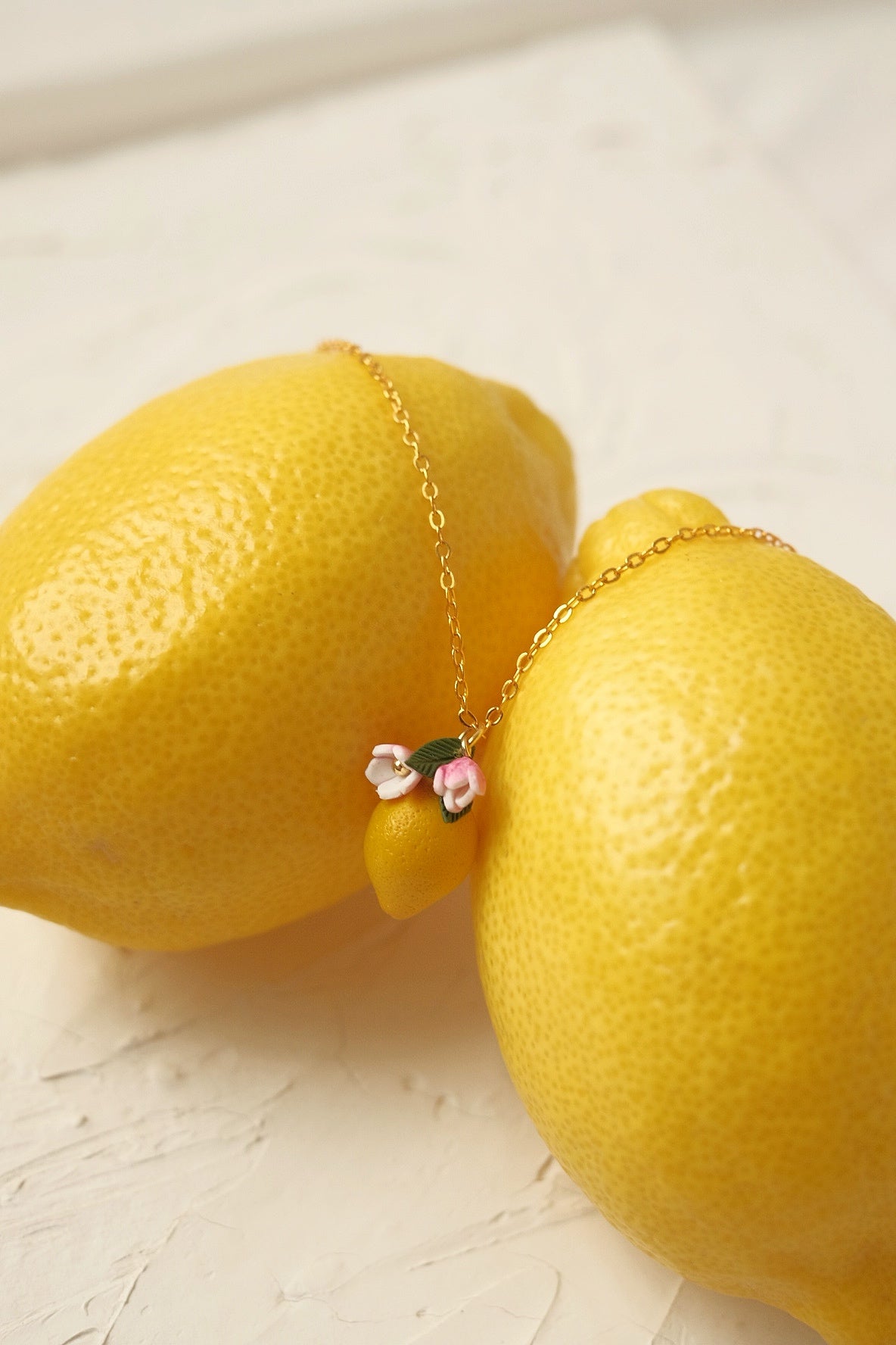Sour Surprise Pendent by Made of clay