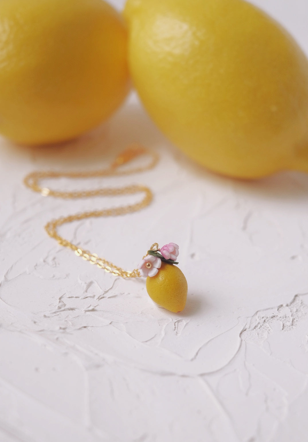 Sour Surprise Pendent by Made of clay