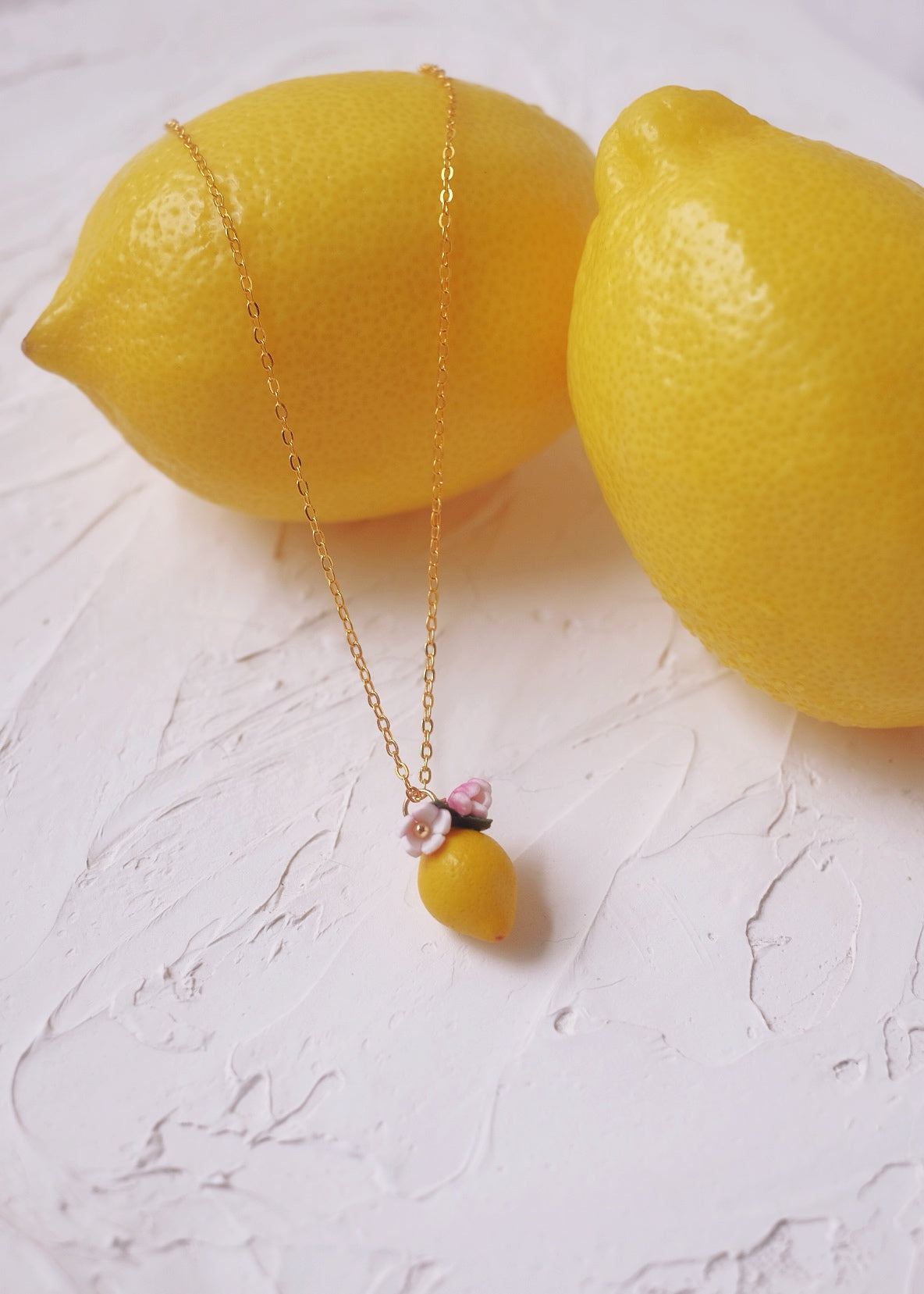 Sour Surprise Pendent by Made of clay
